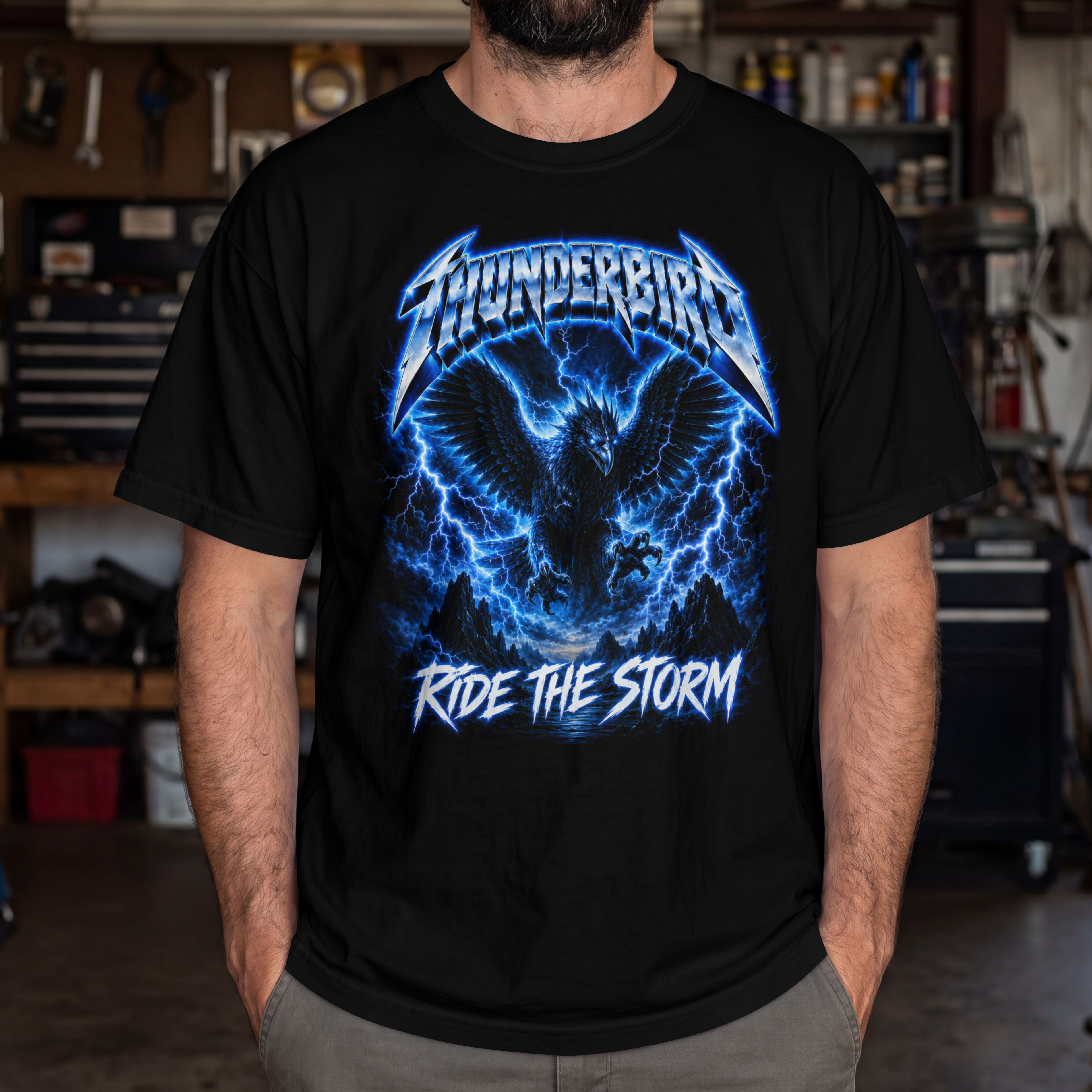 Thunderbird Ride the Storm Cryptid T-Shirt | Electric Blue Metal Graphic Tee